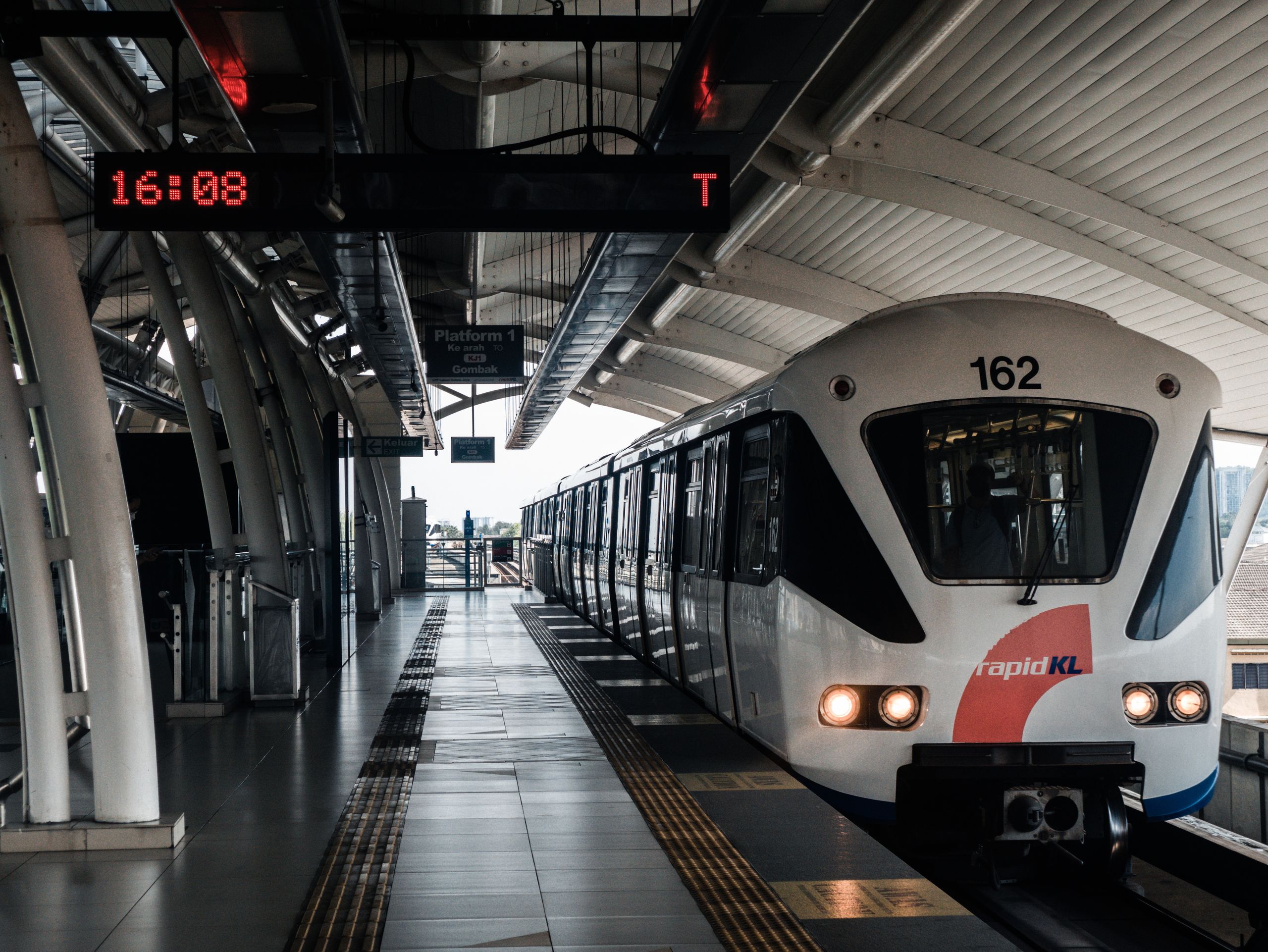 A Rapid KL train at Kuala Lumpur station, showcasing urban public transportation.